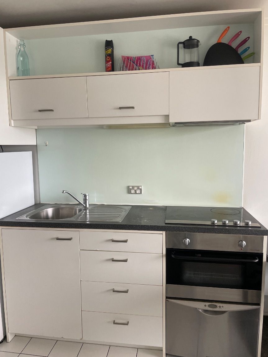Apartment kitchen after a Sweepo end of tenancy clean in Auckland Central