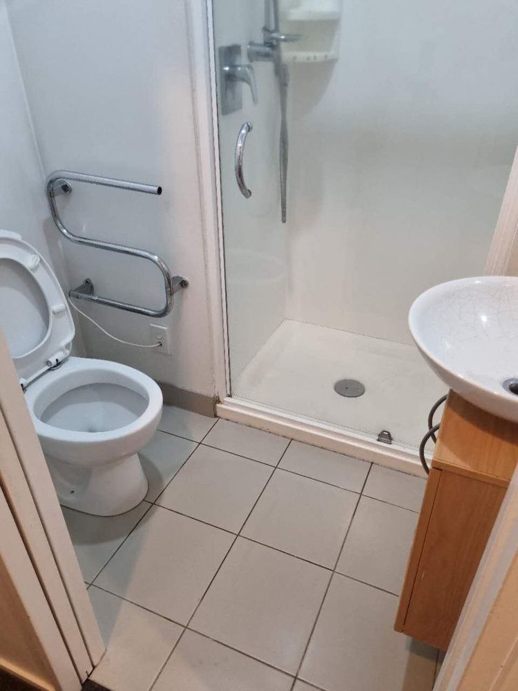 Apartment bathroom after a Sweepo end of tenancy clean in Takapuna